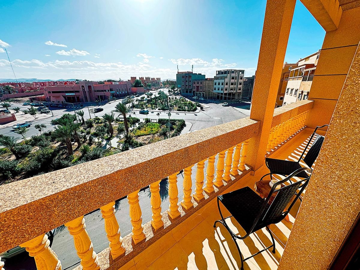 Sdis, Private balcony of the SDIS apartment overlooking palm gardens and Ouarzazate