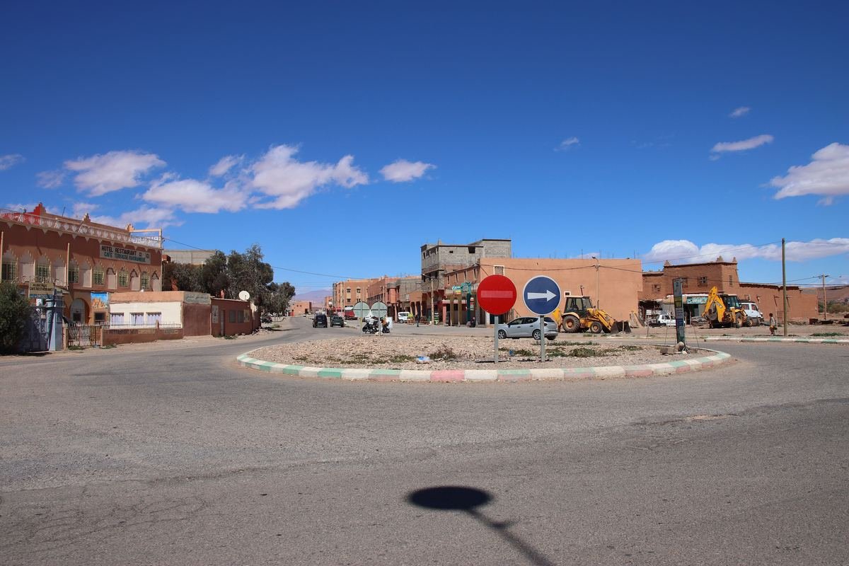 Roundabout with a stop sign at Tabourahte, the junction for Aït Ben Haddou on the N9 west of Ouarzazate