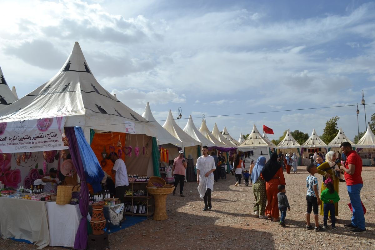 Stalls selling rose water and rose products at the rose fair in Kelaat M'Gouna