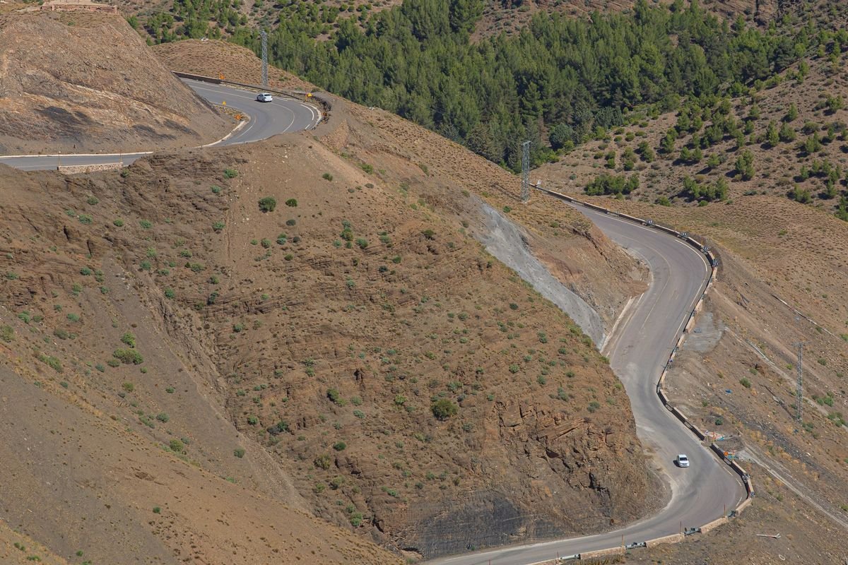 The N9 road winding through the High Atlas mountains at the Tizi n'Tichka pass